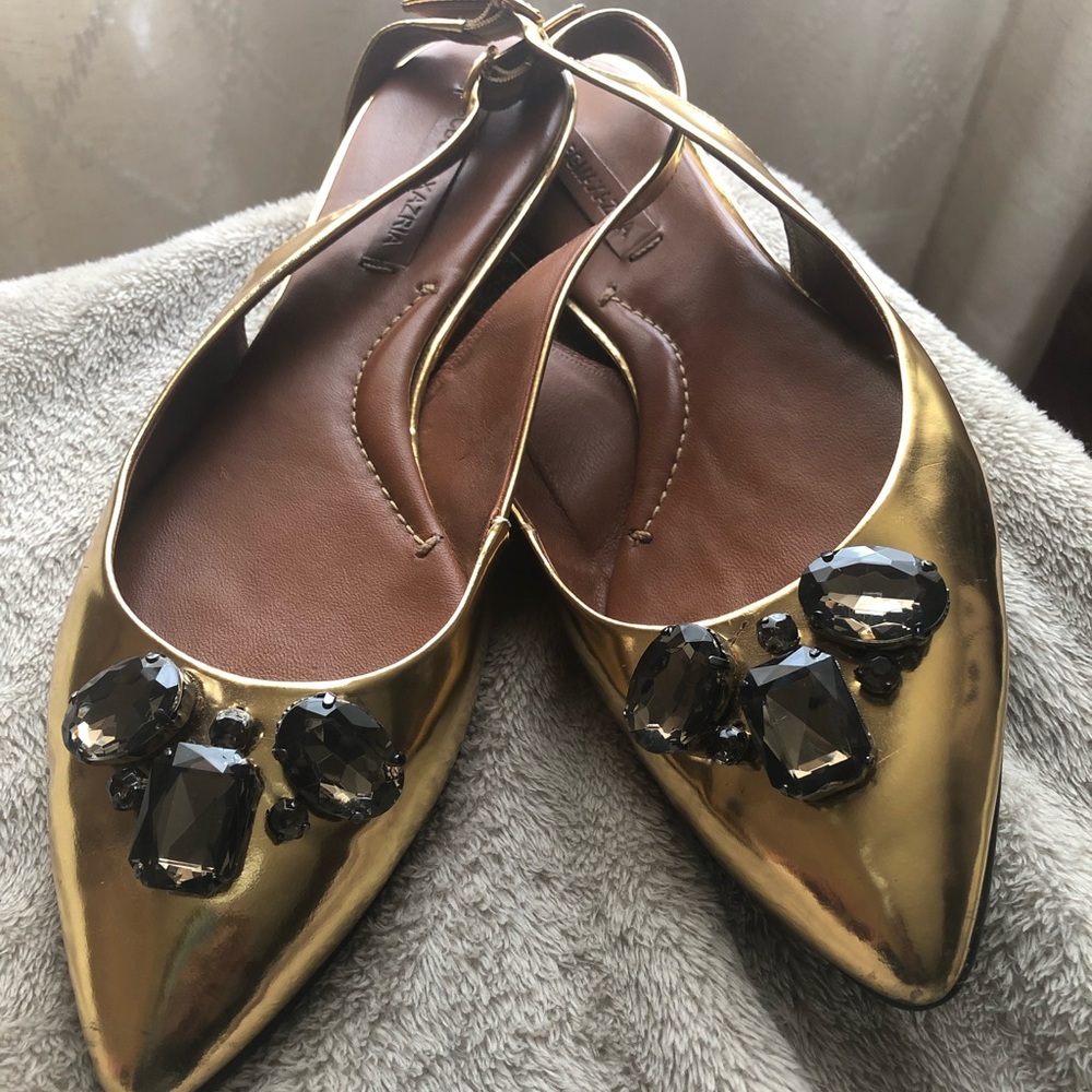 BCBGMaxAzria Gold and Black Flats with Bow Detail